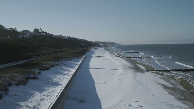 Video Reference: Water, Sky, Snow, Road surface, Landscape, Asphalt, Freezing, Tree, Road, Plant