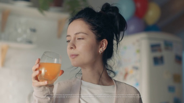 Video Reference: Lip, Eyelash, Neck, Flash photography, Stemware, Happy, Drinkware, Dress, Juice, Bun