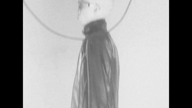 Video Reference: Grey, Monochrome photography, Monochrome, Fashion accessory, Art, Darkness, Font, Electric blue, Still life photography, Circle