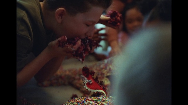Video Reference: Mouth, Temple, Happy, Organism, Sharing, Adaptation, Event, Child, Fun, Tradition