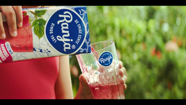 Video Reference: Hand, Bottle, Drinkware, Gesture, Drink, Font, Grass, Electric blue, Nail, Event