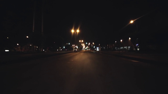 Video Reference: Brown, Street light, Automotive lighting, Road surface, Electricity, Asphalt, Sky, Midnight, Road, Tints and shades