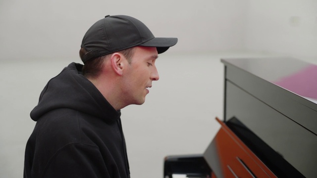 Video Reference: Cricket cap, Cap, Sleeve, Baseball cap, T-shirt, Audio equipment, Computer monitor, Event, Output device, Drawer