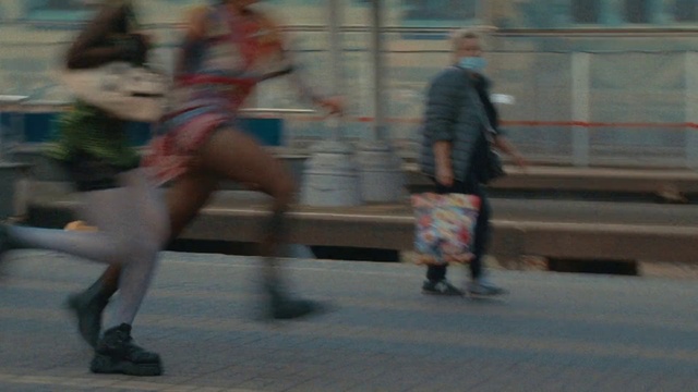 Video Reference: Shorts, Thigh, Knee, Sports, Player, Asphalt, Human leg, Rolling, Recreation, Competition event