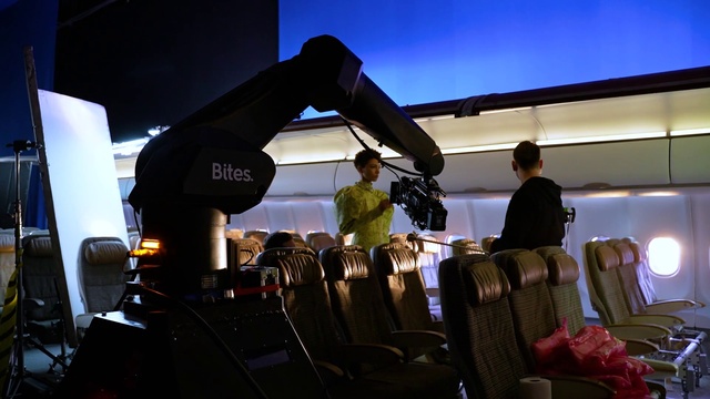 Video Reference: Vehicle, Musician, Air travel, Chair, Music, Videographer, Automotive design, Entertainment, Suit, Audio equipment