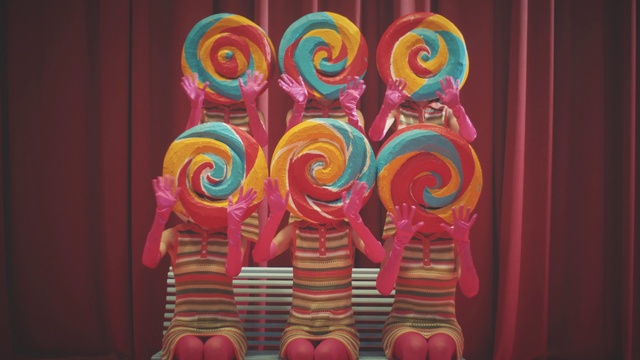 Video Reference: Food, Lollipop, Human body, Pink, Magenta, Art, Toy, Candy, Sweetness, Font