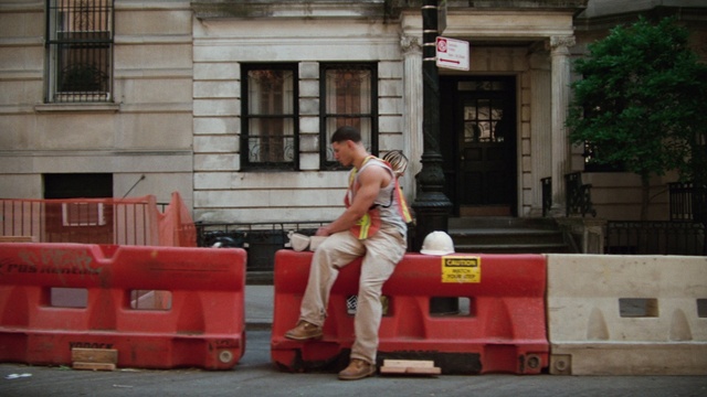 Video Reference: Window, Building, Asphalt, Road surface, Luggage and bags, Leisure, Sidewalk, Road, Recreation, Human leg