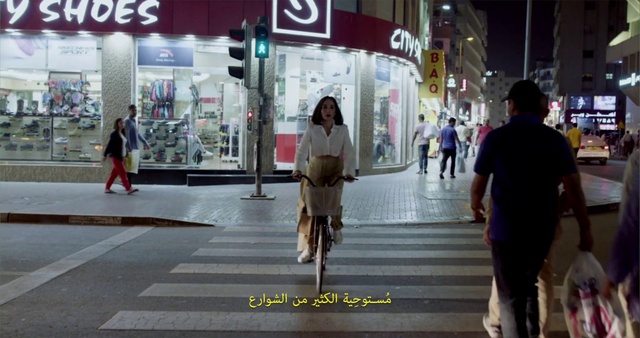 Video Reference: Infrastructure, Fashion, Building, Standing, Sidewalk, Travel, Road, City, Bag, Luggage and bags