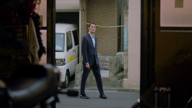 Video Reference: Suit trousers, Vehicle, Tire, Motor vehicle, Automotive design, Automotive exterior, Vehicle door, Gas, Blazer, White-collar worker