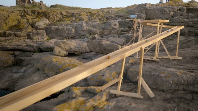 Video Reference: Sky, Wood, Bedrock, Terrain, Formation, Slope, Landscape, Tree, Plant, Ladder