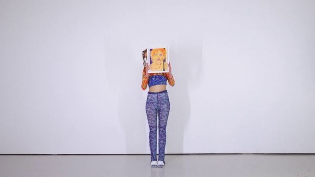 Video Reference: Human body, Sleeve, Waist, Gesture, One-piece garment, Art, Knee, Denim, Fashion design, Electric blue