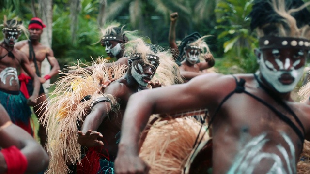 Video Reference: Shorts, Muscle, Hat, Entertainment, Event, Barechested, Leisure, Crowd, Recreation, Performing arts