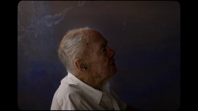 Video Reference: Jaw, Dress shirt, Tints and shades, Wrinkle, Rectangle, Visual arts, Plaster, Paint, Art, Room