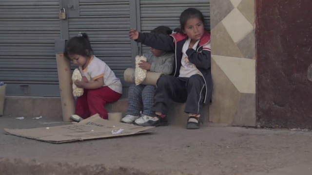 Video Reference: Face, Temple, Road surface, Fun, Leisure, Toddler, Sitting, Flip-flops, Concrete, Flooring