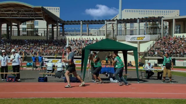 Video Reference: Footwear, Cloud, Sky, Track and field athletics, Shorts, Shade, Leisure, Competition event, Crowd, Recreation