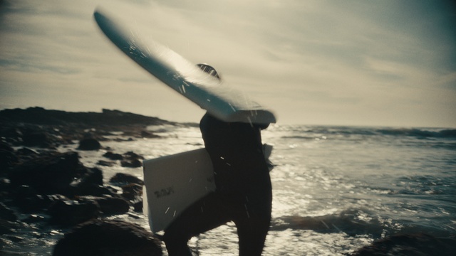 Video Reference: Cloud, Water, Sky, Surfboard, Flash photography, Gesture, Surfing, Surfing Equipment, Aircraft, Sports equipment