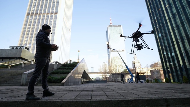 Video Reference: Sky, Building, Daytime, Skyscraper, Tower, Tower block, Art, City, Recreation, Road surface