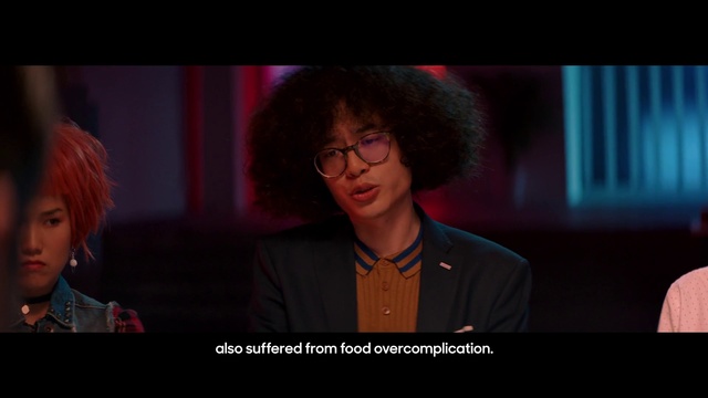 Video Reference: Face, Glasses, Chin, Hairstyle, Vision care, Flash photography, Font, Eyewear, Magenta, Event