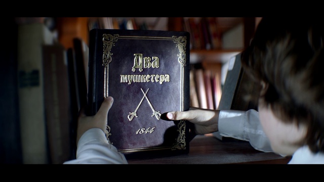 Video Reference: Gesture, Font, Cosmetics, Publication, Window, Book, White-collar worker, Eyewear, Formal wear, Street fashion