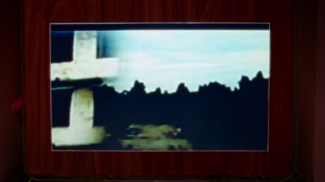 Video Reference: Sky, Output device, Rectangle, Cloud, Font, Wood, Art, Flat panel display, Tree, Tints and shades