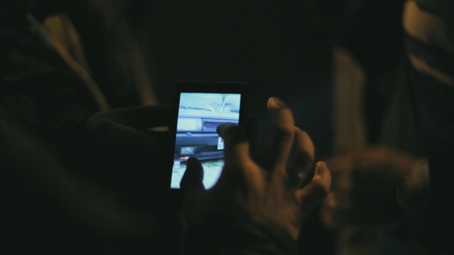 Video Reference: Communication Device, Gesture, Mobile phone, Gadget, Mobile device, Cameras & optics, Portable communications device, Multimedia, Event, Darkness