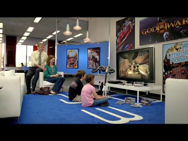Video Reference: indoor, lounge, video game, television, people, gaming, posters, entertainment, living room, console, family, seated, screen, modern interior