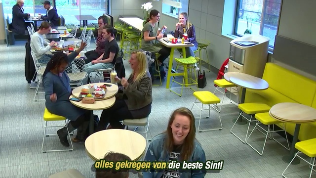 Video Reference: Clothing, Jeans, Table, Furniture, Chair, Smile, Sharing, Yellow, Interior design, Leisure