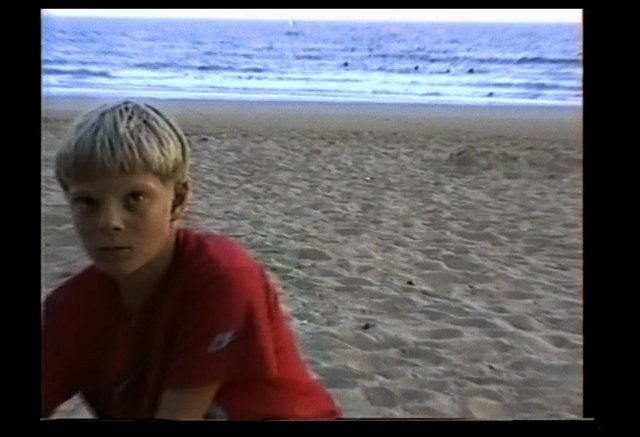Video Reference: beach, ocean, sand, child, red shirt, shoreline, outdoors, vacation, summer, portrait, seascape, coast, waves