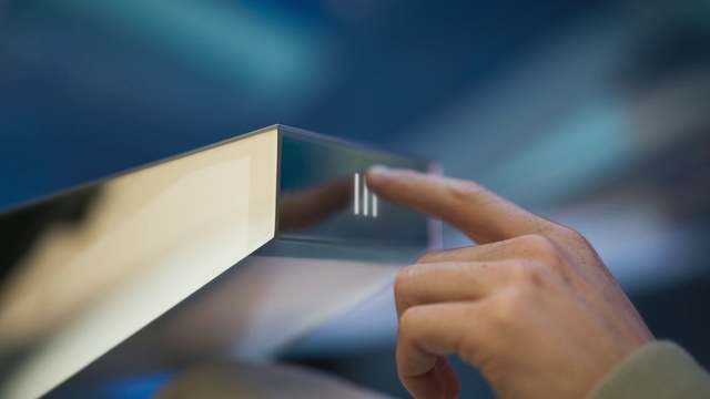 Video Reference: Hand, Gesture, Finger, Sky, Tints and shades, Nail, Electric blue, Font, Thumb, Automotive design