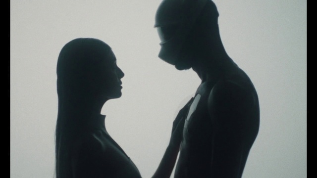 Video Reference: Shoulder, Arm, Neck, Flash photography, Gesture, Style, Atmospheric phenomenon, Art, Elbow, Monochrome