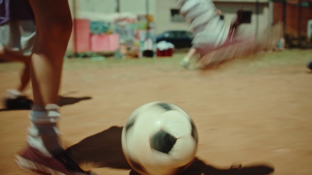 Video Reference: White, Football, Wood, Ball, Flooring, Soccer ball, Snapshot, Human leg, Thigh, Fun