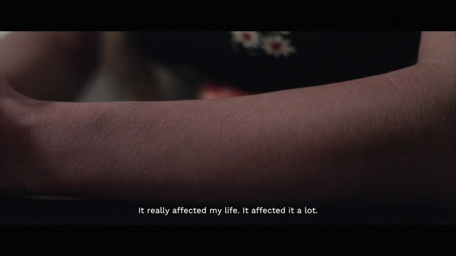 Video Reference: Gesture, Font, Elbow, Wrist, Human leg, Knee, Darkness, Flash photography, Cloud, Nail