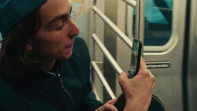 Video Reference: Hand, Revolver, Gesture, Finger, Mobile phone, Cap, Thumb, Eyewear, Gadget, Audio equipment