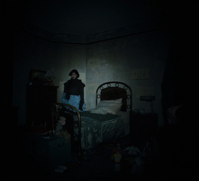 Video Reference: dark, bedroom, interior, bed, person, low light, dim, messy room, night, furniture, shadows, cabin, spooky, indoor, home, vintage bed