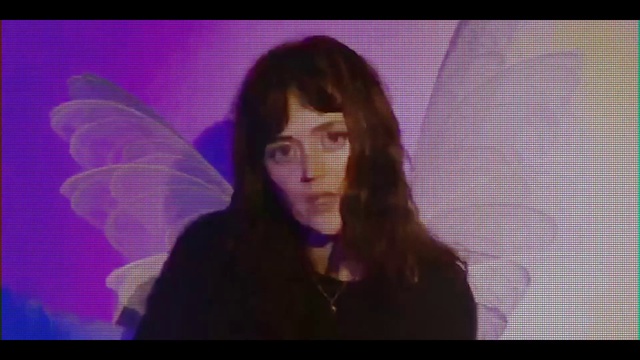 Video Reference: Eyebrow, Mouth, Purple, Eyelash, Jaw, Organism, Flash photography, Violet, Magenta, Insect