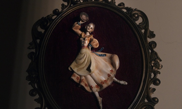 Video Reference: Dress, Human body, Picture frame, Flash photography, Art, Circle, Visual arts, Fashion accessory, Mythology, Metal