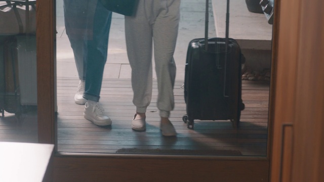 Video Reference: Flooring, Wood, Floor, Bag, Knee, Luggage and bags, Calf, Cleanliness, Hardwood, Human leg