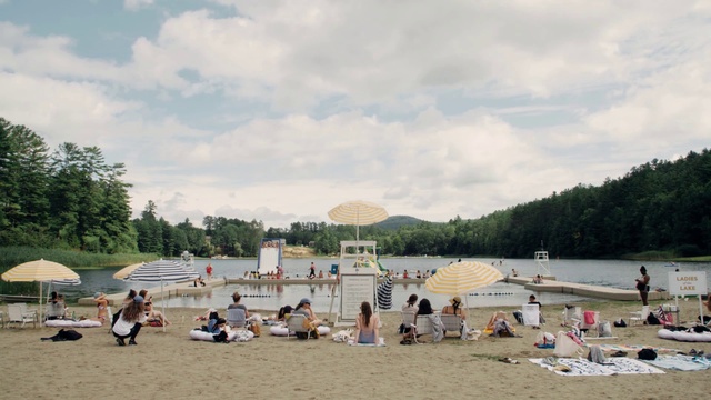 Video Reference: Cloud, Sky, Water, People on beach, Tree, Tent, Lake, Travel, Coastal and oceanic landforms, Beach