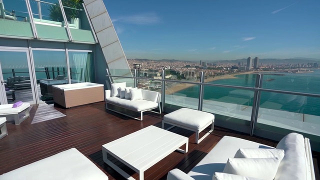 Video Reference: Building, Furniture, Daytime, Property, Sky, Water, Table, Azure, Cloud, Shade