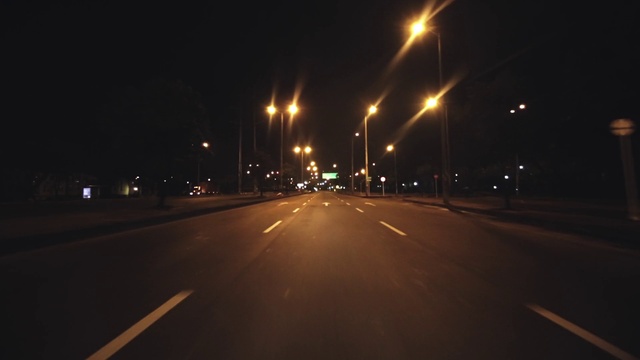 Video Reference: Brown, Street light, Automotive lighting, Road surface, Electricity, Asphalt, Amber, Sky, Thoroughfare, Midnight