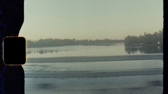 Video Reference: Water, Sky, Body of water, Wood, Lake, Atmospheric phenomenon, Tree, Horizon, Tints and shades, Freezing