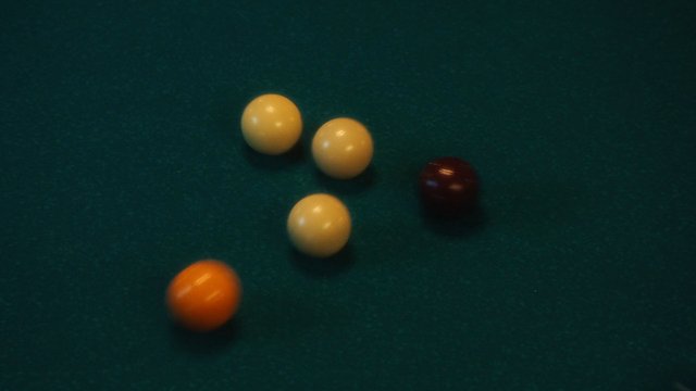 Video Reference: billiards, pool table, billiard balls, green felt, sports, game, tabletop, motion blur, overhead view