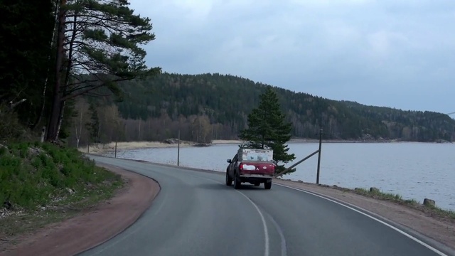 Video Reference: Sky, Water, Land vehicle, Cloud, Vehicle, Tire, Plant, Car, Wheel, Road surface