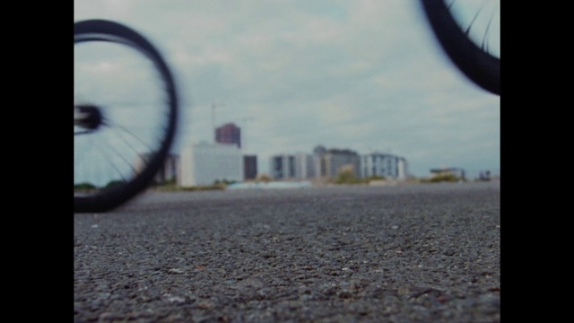 Video Reference: Tire, Bicycle, Sky, Wheel, Automotive tire, Bicycle tire, Cloud, Bicycle wheel, Automotive mirror, Road surface