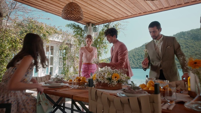 Video Reference: Table, Furniture, Tableware, Chair, Orange, Dress, Plant, Tablecloth, Sky, Flower