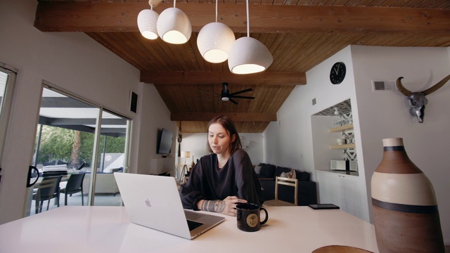 Video Reference: Table, Laptop, Furniture, Lighting, Interior design, Building, Chair, Personal computer, Desk, Lamp
