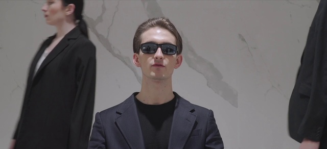 Video Reference: Lip, Vision care, Human, Fashion, Neck, Eyewear, Goggles, Sleeve, Sunglasses, Street fashion