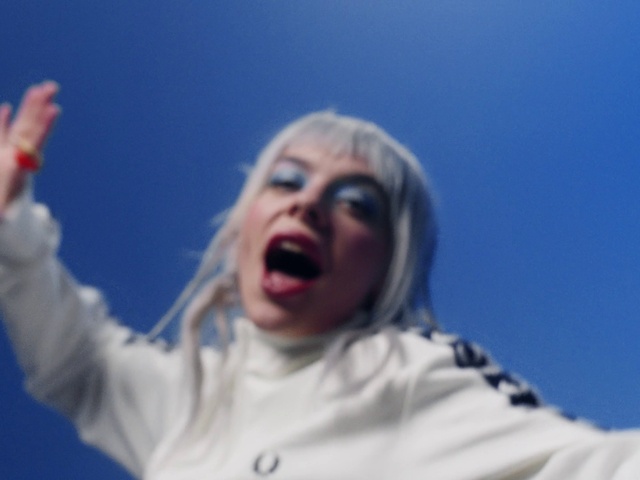 Video Reference: Arm, Human body, Gesture, Entertainment, Happy, Music artist, Event, Sky, Fun, Music