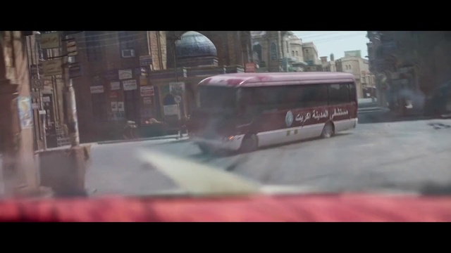 Video Reference: Bus, Automotive lighting, Motor vehicle, Automotive mirror, Vehicle, Building, Mode of transport, Rear-view mirror, Asphalt, Tour bus service