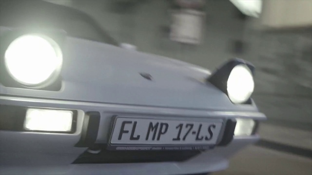 Video Reference: Vehicle registration plate, Land vehicle, Vehicle, Grille, Automotive lighting, Hood, Car, Motor vehicle, Automotive parking light, Automotive design